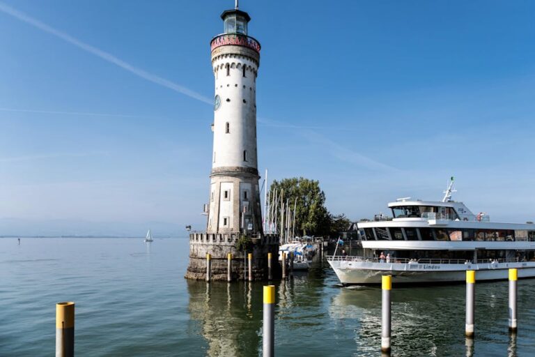 gitzenweiler hof - Beautiful view of Lindau Lighthouse and ship on Lake Constance, Germany.